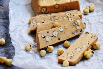 Homemade hazelnut fudge on the light background