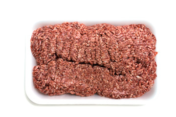 minced red meat in white foam plate