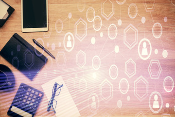 Double exposure of social network theme drawing and work table top veiw. Concept of international connection.