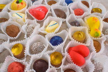 A lot of delicious multi-colored sweets. Close-up.