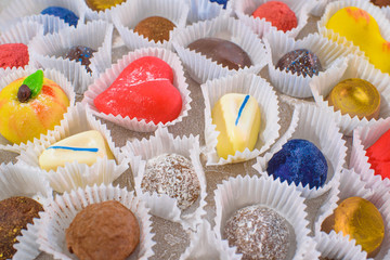 A lot of delicious multi-colored sweets. Close-up.