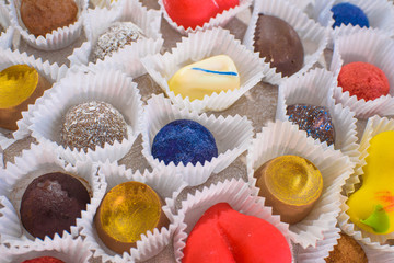 A lot of delicious multi-colored sweets. Close-up.