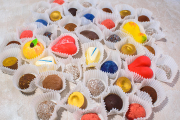 A lot of delicious multi-colored sweets. Close-up.