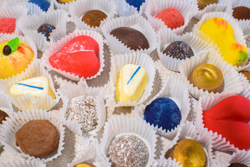 A lot of delicious multi-colored sweets. Close-up.