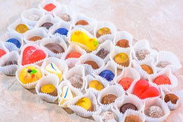 A lot of delicious multi-colored sweets. Close-up.