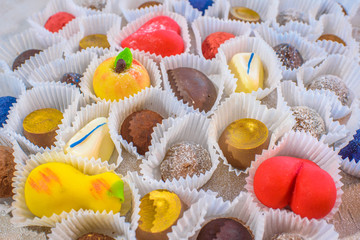 A lot of delicious multi-colored sweets. Close-up.