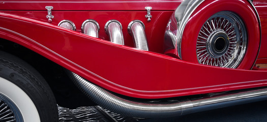 Detail of Classic Red Roadster Exhaust