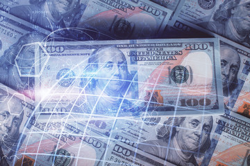 Double exposure of world map drawing over us dollars bill background. International concept.