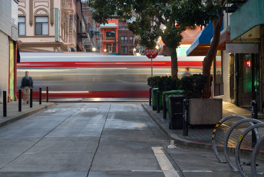 Bus whooshing by on the streets of San Francisco.