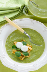 Cream of Green Pea Soup Garnished with Quail Egg and Fried Vegetables