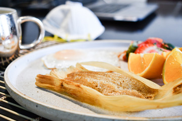 Mexican sweet tamale with fried egg during the quarantine period