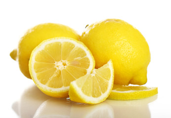 Fresh yellow lemons on white background