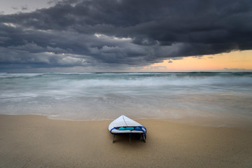 Fototapeta na wymiar Surfboard on the beach, Sydney Australia