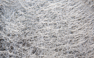 White glass canvas background with a beautiful gossamer pattern, construction, textures, design.