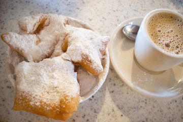 World Famous Cafe' Du Monde's  Beignet's and Cup of Coffee in New Orlean's, Louisiana.