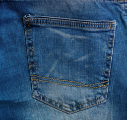 pocket on blue faded jeans