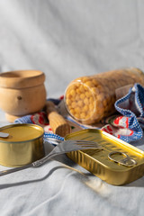still life composition of canned food cans