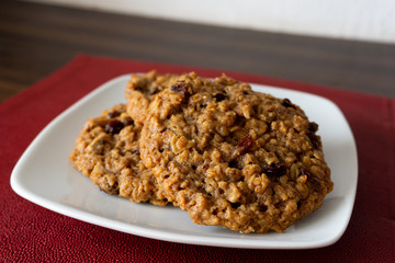 Tasty  oatmeal with raisins cookies on a plate