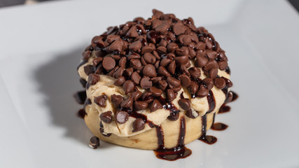Cinnamon bun with chocolate toppings 