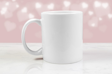 11 oz. White Mug Mockup with Glowing White Hearts on a Pink Background