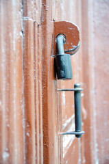 Antique door lock on a wooden door