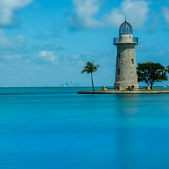 Boca Chita Lighthouse Reflecting in Blue Water