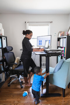 Mother son working from home during quarantine