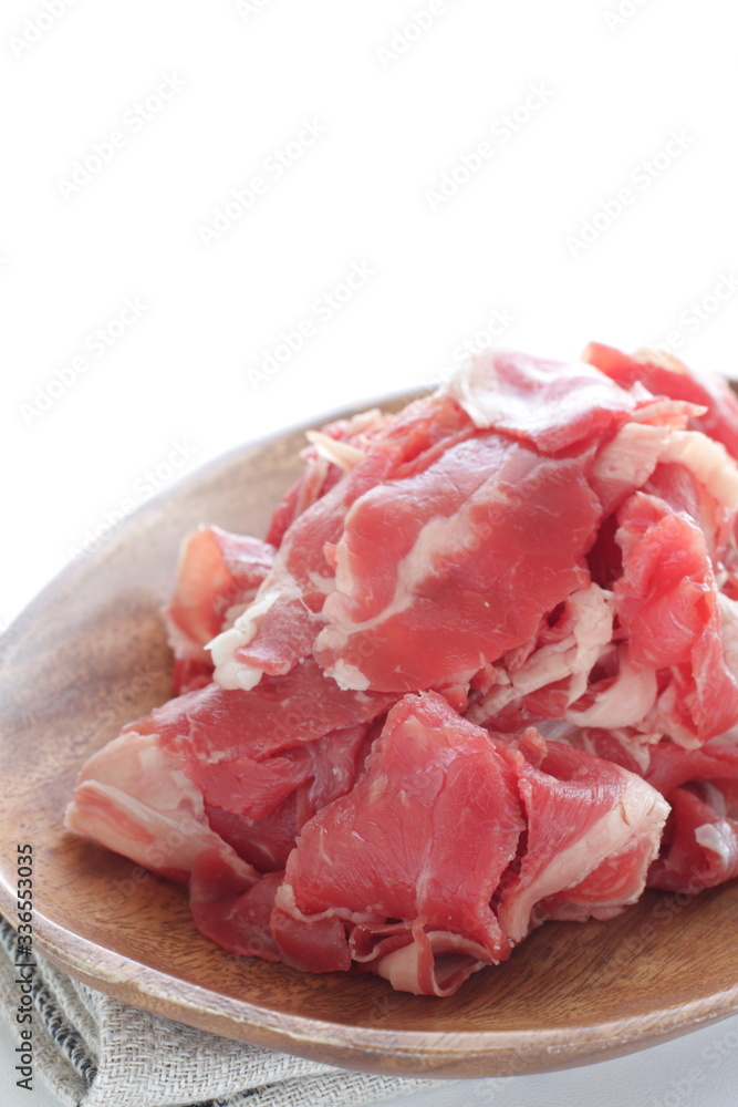 Wall mural Raw sliced beef for food ingredient on white background