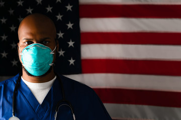 Moody portrait of medical healthcare worker wearing n95 mask