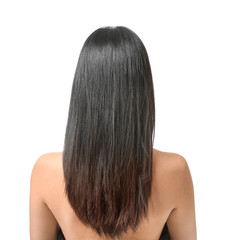Young Asian woman with beautiful hair on white background