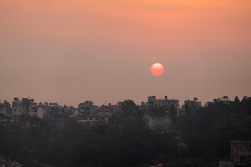 Sun Rising Above the Houses in Kathmandu