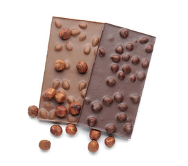 Sweet chocolate with nuts on white background