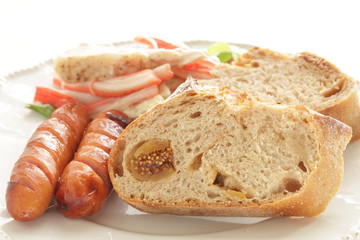 Homemade fig French bread and sausage with crab stick chicken salad
