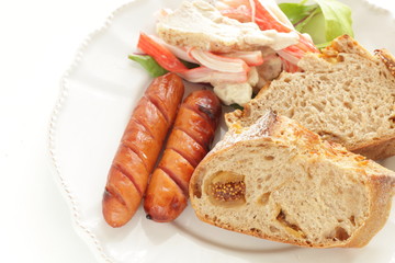 Homemade fig French bread and sausage with crab stick chicken salad