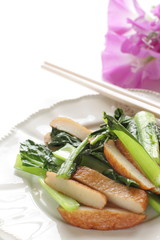 Asian food, fish cake and green leaf vegetable stir fried
