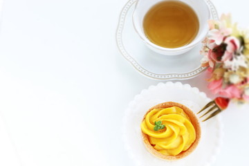Homemade pumpkin tart with mint