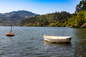 Fototapeta na wymiar Boat on the river and tranquil scene