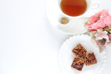 Mixed nuts and cookie on plate with copy space