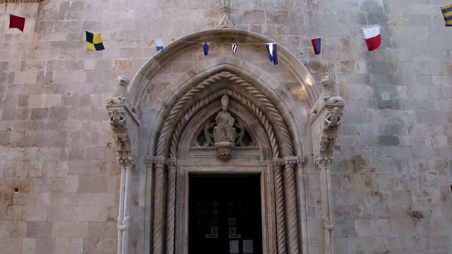 Cathedral of Saint Mark doorway in Korcula old town, Croatia. Korcula is a historic fortified town on the protected east coast of the island of Korcula