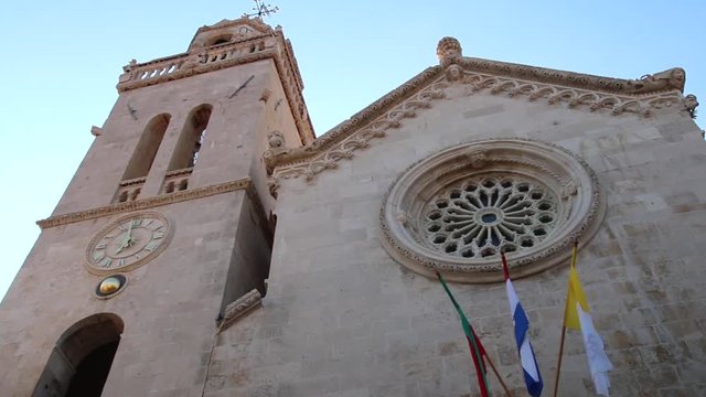 Cathedral of Saint Mark in Korcula old town with the bells ringing, Croatia
