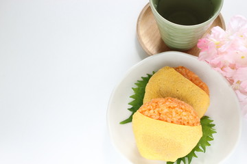 Japanese food, ketchup and wrapped egg rice ball