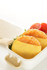 Japanese food, ketchup and wrapped egg rice ball