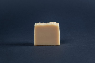 Yellow bar soap on a dark backgroud