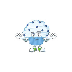 An image of vanilla blue cupcake in grinning mascot cartoon style