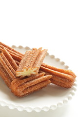 Sweet food Churro on dish for fast food dessert
