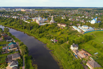 Aerial view of the Borisoglebsky Monastery in the cityscape on a July day (aerial photography). Torzhok, Russia