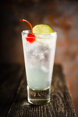 Rum collins cocktail (variation of traditional Tom collins). Selective focus. Shallow depth of field.