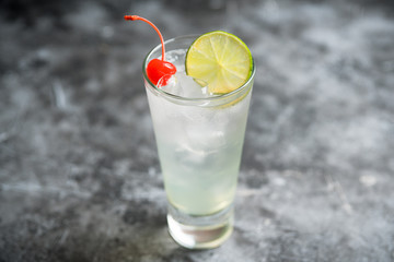 Rum collins cocktail (variation of traditional Tom collins). Selective focus. Shallow depth of field.