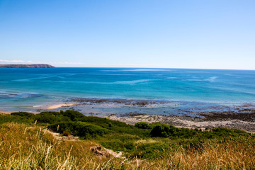 Blue sky coastal edge, beach, sea and blue skies