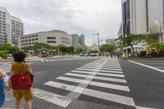 Street view of intersection at Kokusai Shopping Street in Naha, Okinawa, Japan